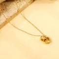 Collana con ciondolo a doppio cerchio con diamanti e numeri romani, 44+5 cm, colore oro.