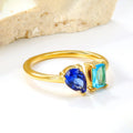 Anello doppio placcato oro 18 carati con pietre preziose multicolore.