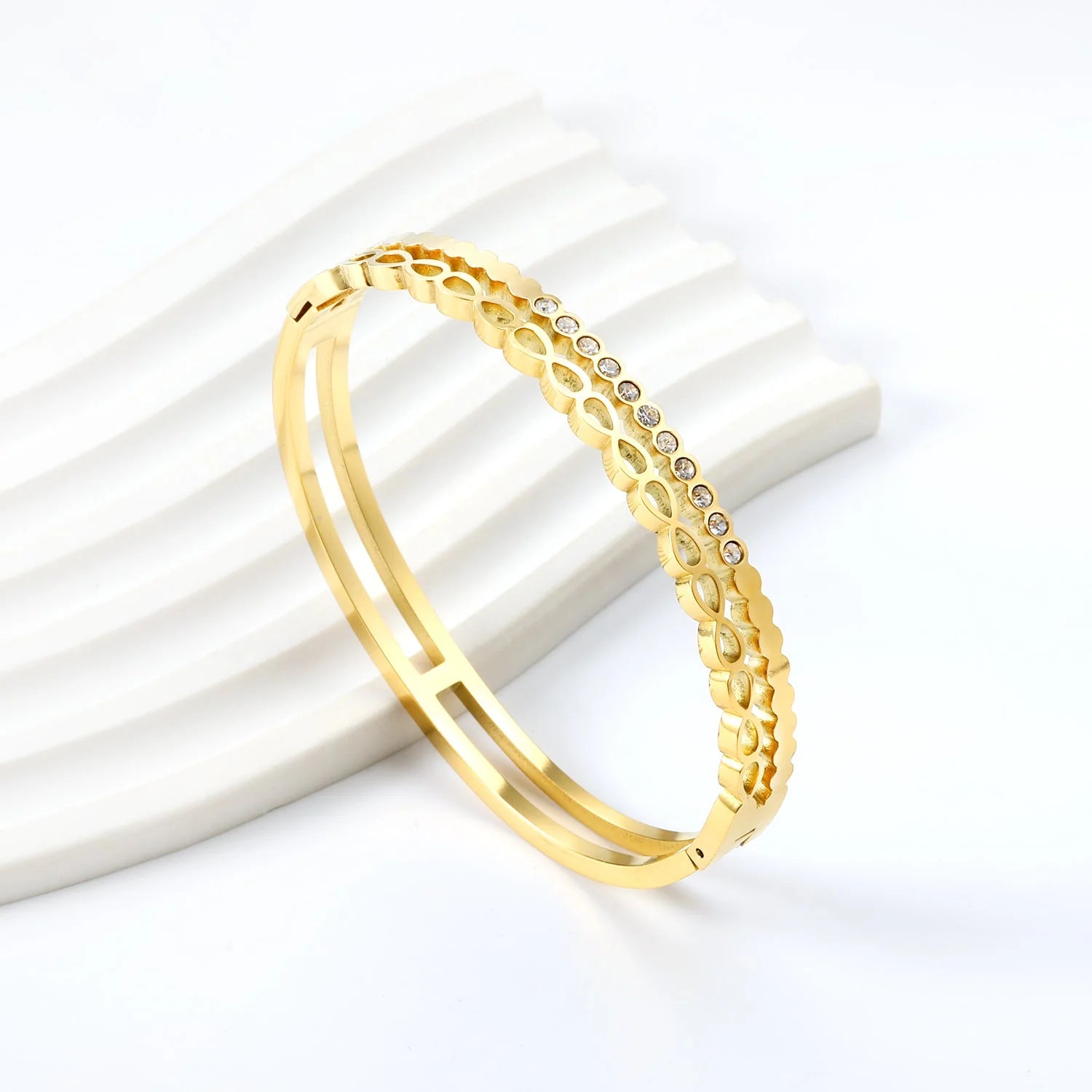 Bracciale a doppio filo color oro con diamanti