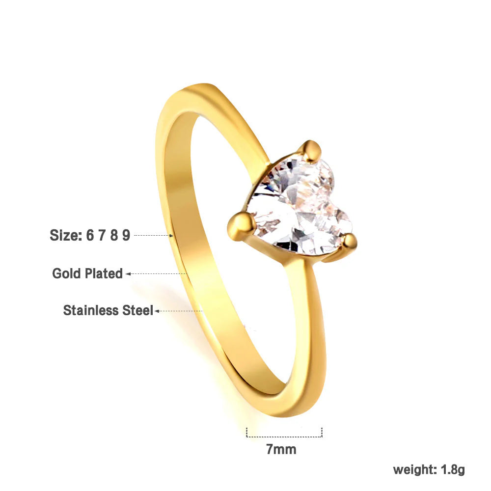 Anello a tre griffe a forma di cuore con diamante bianco