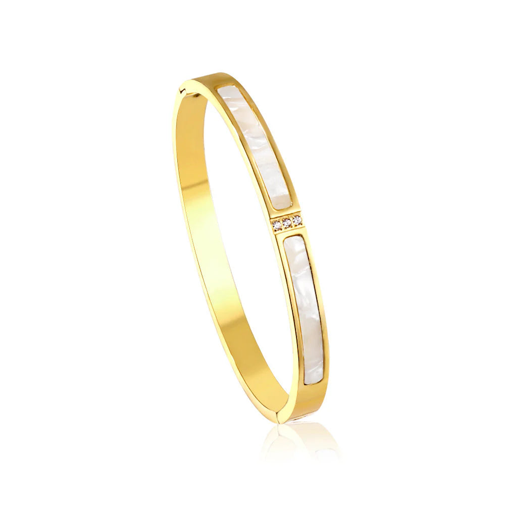 Bracciale con diamanti e due incastonature a conchiglia