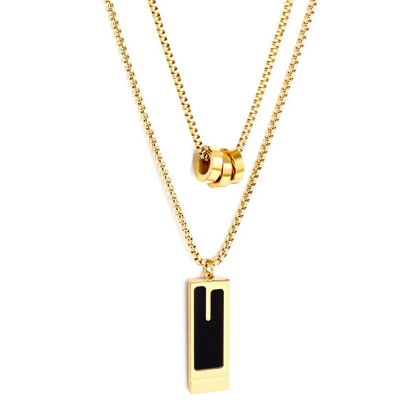 Collana a doppia catena con tre ciondoli rotondi cavi e ciondolo rettangolare con goccia d'olio nera.
