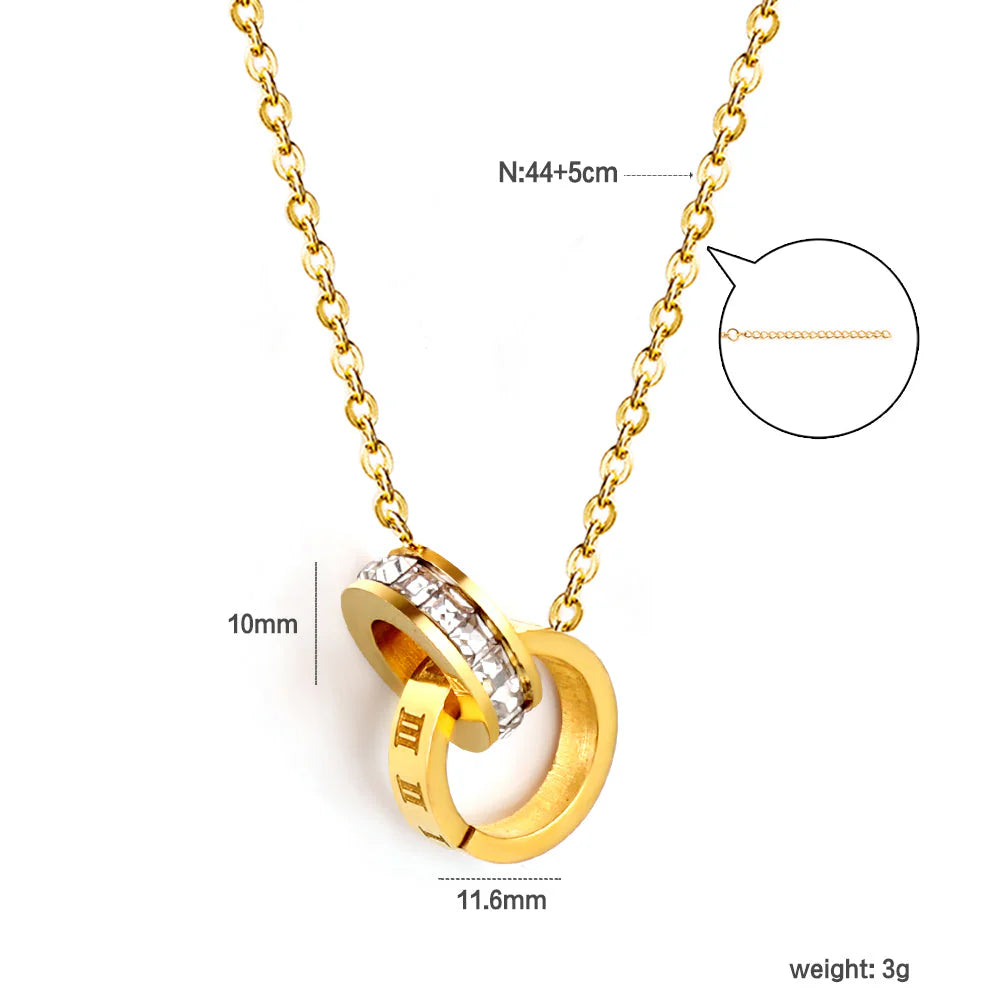 Collana con ciondolo a doppio cerchio con diamanti e numeri romani, 44+5 cm, colore oro.