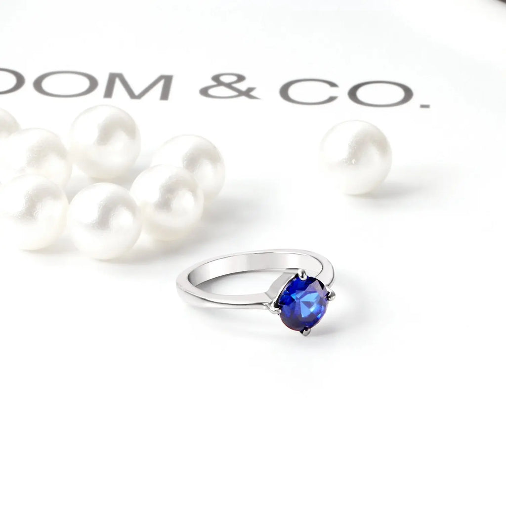 Elegante anello di fidanzamento con piccolo cerchio e zirconi cubici blu in acciaio inossidabile per donna, gioiello da matrimonio color argento